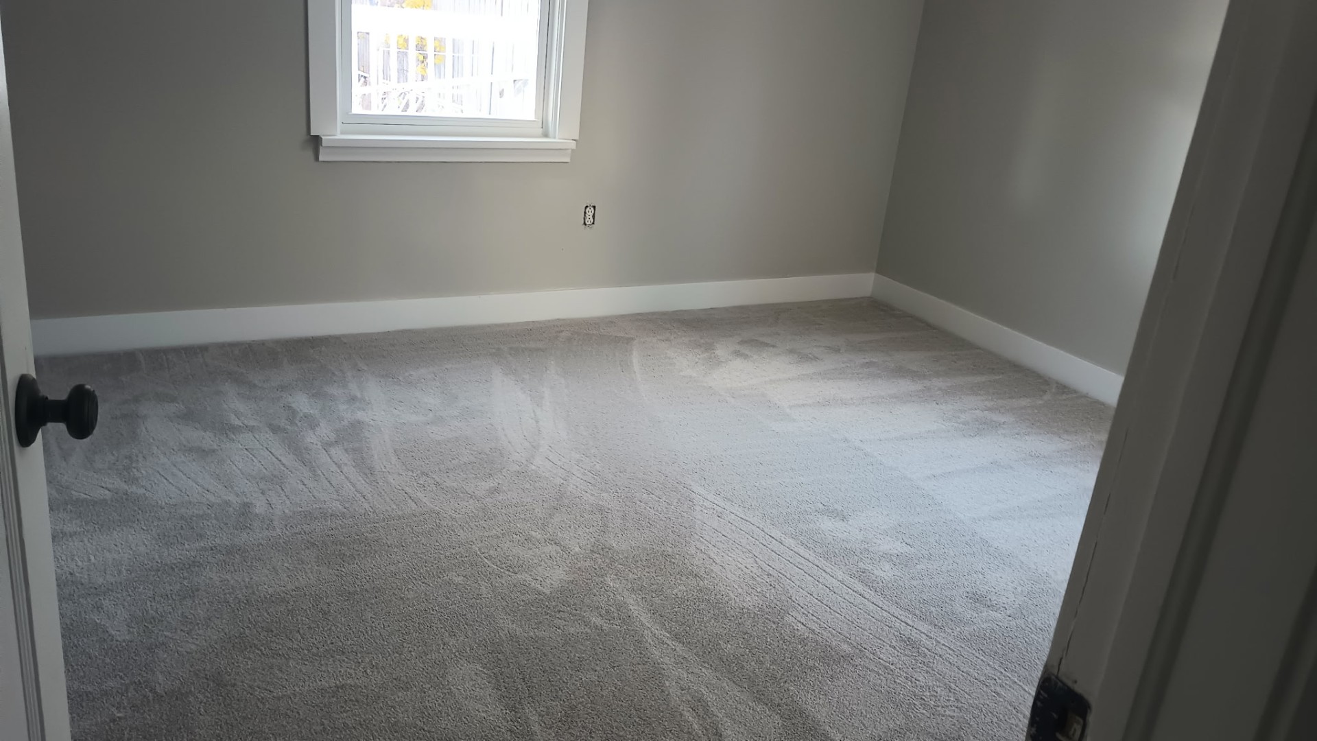 Finished bedroom with fresh paint and new carpet